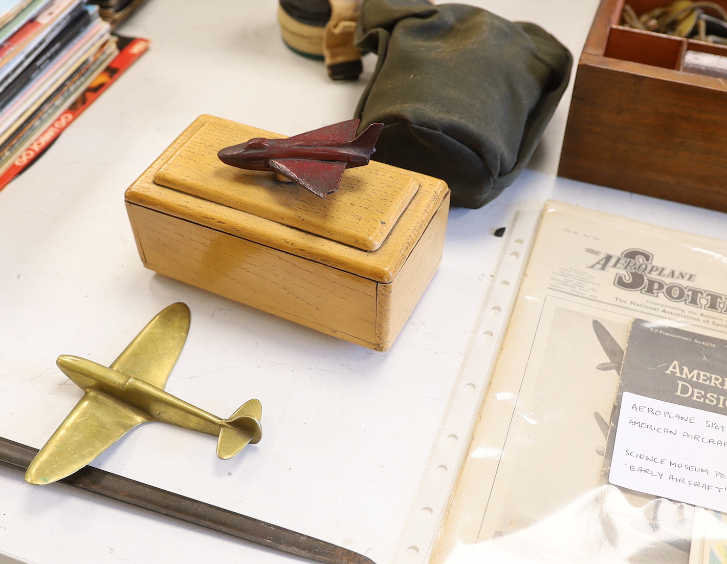 A quantity of war memorabilia including gas masks, postcards etc